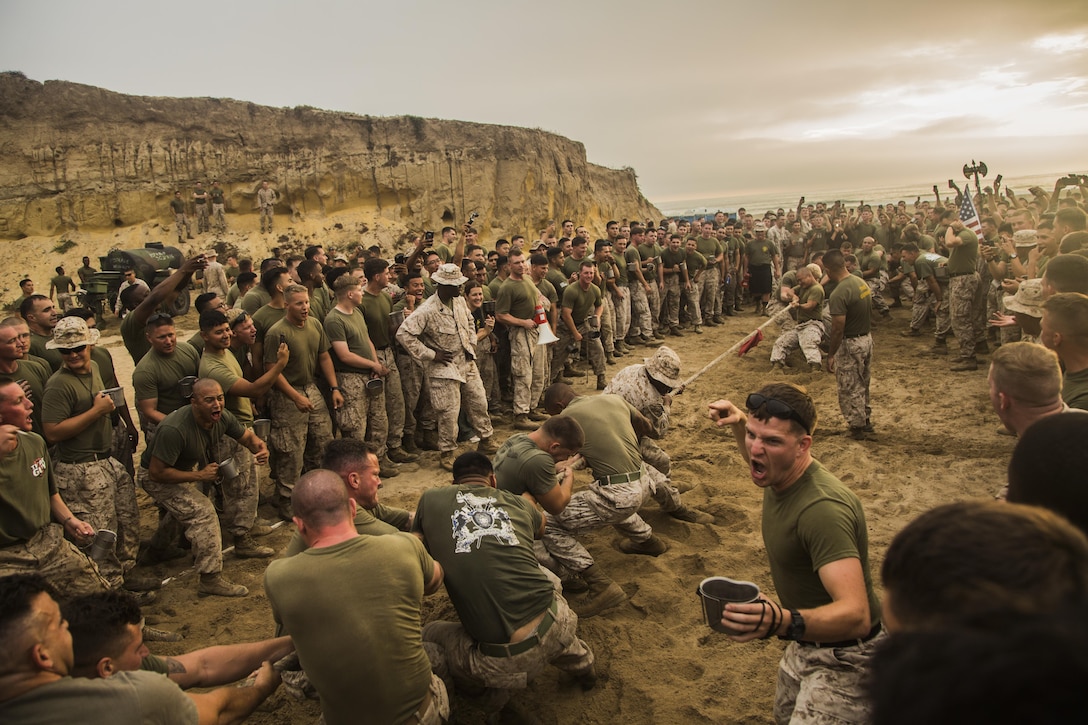 Features: Marines participate in a tug of war competition during warrior night at Marine Corps Base Camp Pendleton, Calif., July 1, 2015. Warrior night is an annual event held to build camaraderie in the battalion. The Marines are assigned to the 1st Light Armored Reconnaissance Battalion, 1st Marine Division. U.S. Marine Corps photo by Lance Cpl. Ryan P. Kierkegaard