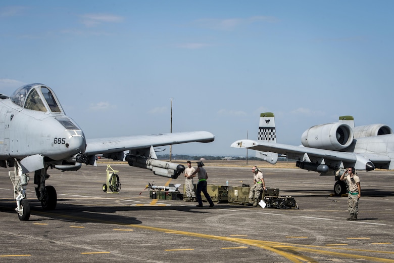 U.S. Air Force Senior Airman Daniel Mobili, a dedicated crew chief with the 51st Fighter Wing, Osan Air Base, Republic of Korea, salutes the pilot an A-10C Thunderbolt II after marshalling the aircraft for take off at Clark Air Base, Philippines, April 19, 2016. Maintenance Airmen play a critical role in the newly stood up Air Contingent’s ongoing operations ranging from air and maritime domain awareness, personnel recovery, combating piracy, and assurance all nations have access to the regional air and maritime domains in accordance with international law. Mobili is a Miami, Florida, native. (U.S. Air Force photo by Staff Sgt. Benjamin W. Stratton)