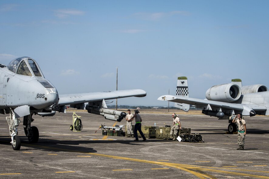U.S. Air Force Senior Airman Daniel Mobili, a dedicated crew chief with the 51st Fighter Wing, Osan Air Base, Republic of Korea, salutes the pilot an A-10C Thunderbolt II after marshalling the aircraft for take off at Clark Air Base, Philippines, April 19, 2016. Maintenance Airmen play a critical role in the newly stood up Air Contingent’s ongoing operations ranging from air and maritime domain awareness, personnel recovery, combating piracy, and assurance all nations have access to the regional air and maritime domains in accordance with international law. Mobili is a Miami, Florida, native. (U.S. Air Force photo by Staff Sgt. Benjamin W. Stratton)