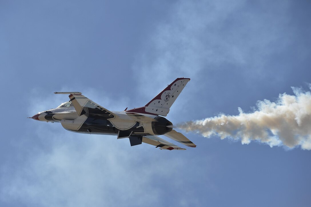 Air Force Capt. Nicholas Eberling performs a high alpha maneuver during a practice show at Luke Air Force Base, Ariz., April 1, 2016. Eberling is a pilot, Thunderbird 5, assigned to the Air Force Thunderbirds, and flies an F-16 Fighting Falcon. Air Force photo by Tech. Sgt. Christopher Boitz 