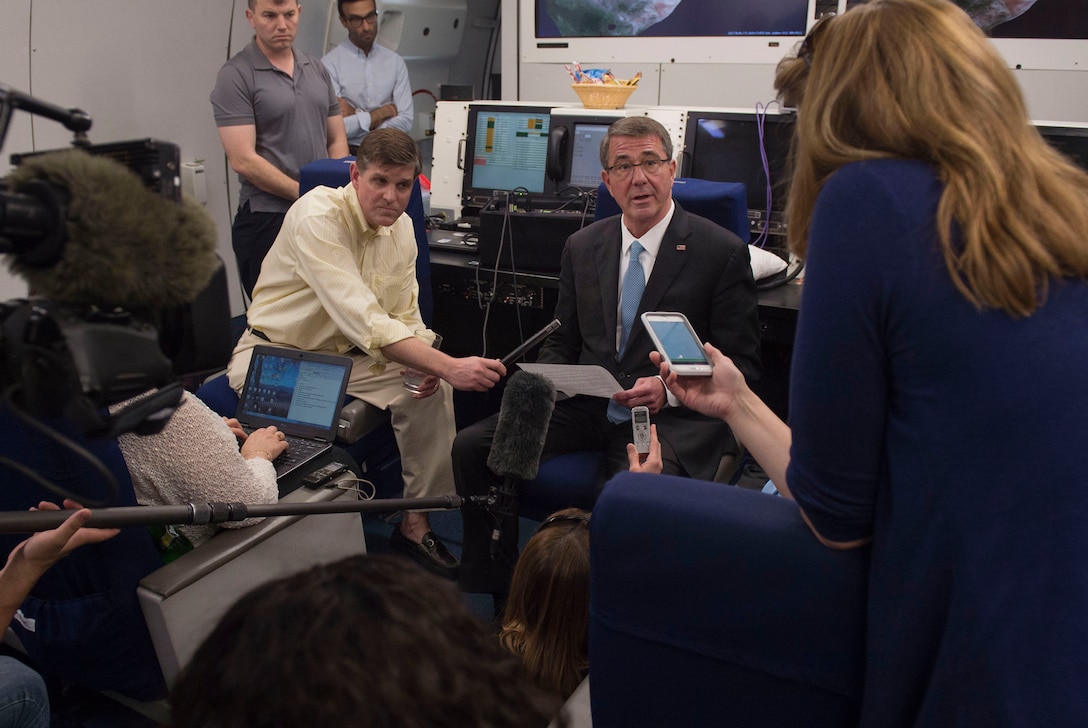 Defense Secretary Ash Carter speaks with reporters on board an E4-B aircraft as he departs Gulf Cooperation Council Summit in Riyadh, Saudi Arabia, April 21, 2016. Carter visited Saudi Arabia to help accelerate the lasting defeat of the Islamic State of Iraq and the Levant, and participate in the U.S. Gulf Cooperation Council Summit. DoD photo by Senior Master Sgt. Adrian Cadiz