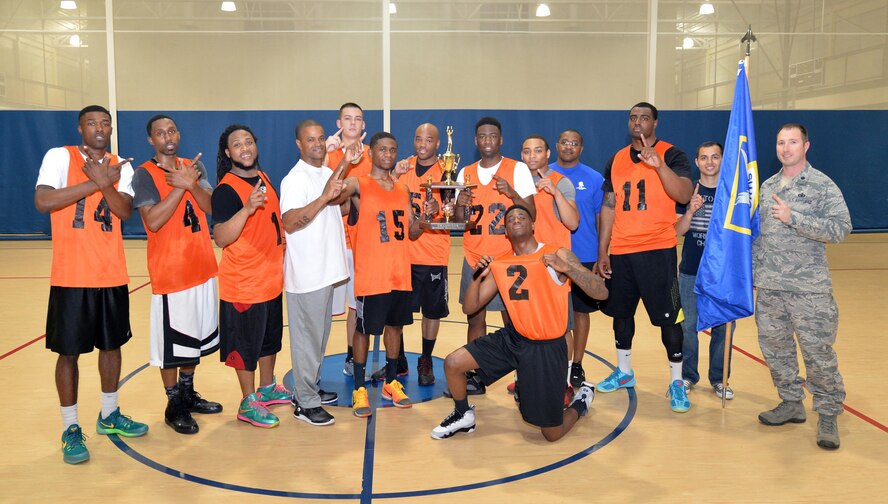 The 2nd Security Forces Squadron championship basketball team poses for a photo at Barksdale Air Force Base, La., April 14, 2016. The team defeated the 2nd Communications Squadron team in back-to-back games to win the championship by scores of 66-57 and 55-49. (U.S. Air Force photo/Airman 1st Class Curt Beach)