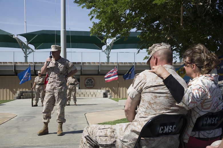 Maj. Gen. Lewis A. Craparotta, Combat Center Commanding General, describes the impact Col. Andrew R. Kennedy, former director of Tactical Training and Exercise Control Group, had on the Marine Corps through his 30-year service during Kennedy’s retirement ceremony at Lance Cpl. Torrey L. Gray Field April 15, 2016. (Official Marine Corps photo by Cpl. Medina Ayala-Lo/Released)