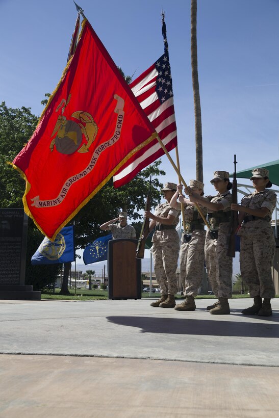 The Combat Center Color Guard presents the colors during the retirement ceremony of Col. Andrew R. Kennedy, former director of Tactical Training and Exercise Control Group, at Lance Cpl. Torrey L. Gray Field April 15, 2016. (Official Marine Corps photo by Cpl. Medina Ayala-Lo/Released)