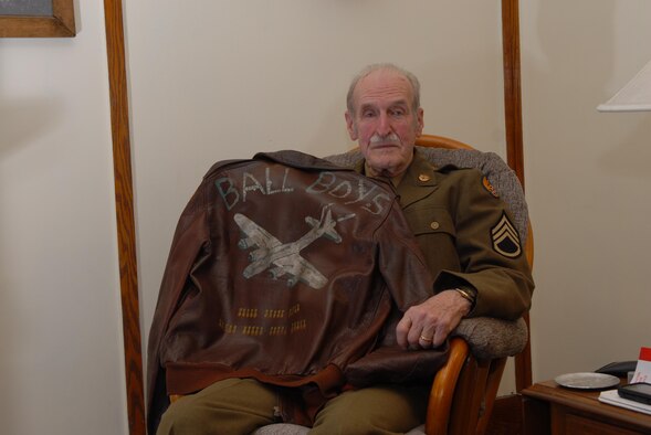 Staff Sergeant (Sep.) Harry Grimm boarded a train in July 1943 for U.S. Army basic training and to eventually become an aerial gunner in the Army Air Corps.  After months of training, he reported to the 351st Bomb Group and, within a week, was flying his first combat mission as a tail-gunner aboard a B-17.  During the next nine months, Grimm flew a total of 35 missions, mainly targeting oil refineries and production facilities in Germany.  He remembered “flying through flak so thick that you could hardly see the sun,” in an area known as Flak Alley.  He also remembers the German fighter that flew vertically up through the middle of his formation.  Grimm shot the Luftwaffe aircraft in the belly as it passed, before another gunner scored hits on the cockpit.  On his final mission, Grimm’s aircraft developed engine trouble and was spewing oil; the crew barely made it back.  Through all of it, Grimm said that he never thought of dying or retirement…only of doing his job on that mission.  During his 27 months in the military, Grimm earned three Bronze Battle Stars and the Air Medal with five oak leaf clusters.