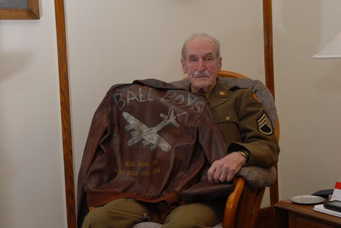 Staff Sergeant (Sep.) Harry Grimm boarded a train in July 1943 for U.S. Army basic training and to eventually become an aerial gunner in the Army Air Corps.  After months of training, he reported to the 351st Bomb Group and, within a week, was flying his first combat mission as a tail-gunner aboard a B-17.  During the next nine months, Grimm flew a total of 35 missions, mainly targeting oil refineries and production facilities in Germany.  He remembered “flying through flak so thick that you could hardly see the sun,” in an area known as Flak Alley.  He also remembers the German fighter that flew vertically up through the middle of his formation.  Grimm shot the Luftwaffe aircraft in the belly as it passed, before another gunner scored hits on the cockpit.  On his final mission, Grimm’s aircraft developed engine trouble and was spewing oil; the crew barely made it back.  Through all of it, Grimm said that he never thought of dying or retirement…only of doing his job on that mission.  During his 27 months in the military, Grimm earned three Bronze Battle Stars and the Air Medal with five oak leaf clusters.