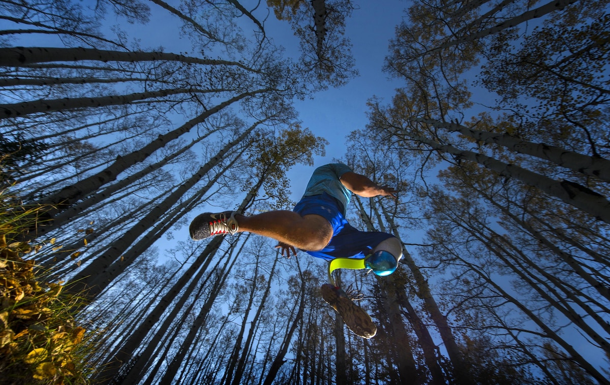 Army Staff Sgt. Gideon Connelly leaps over a gutter during training