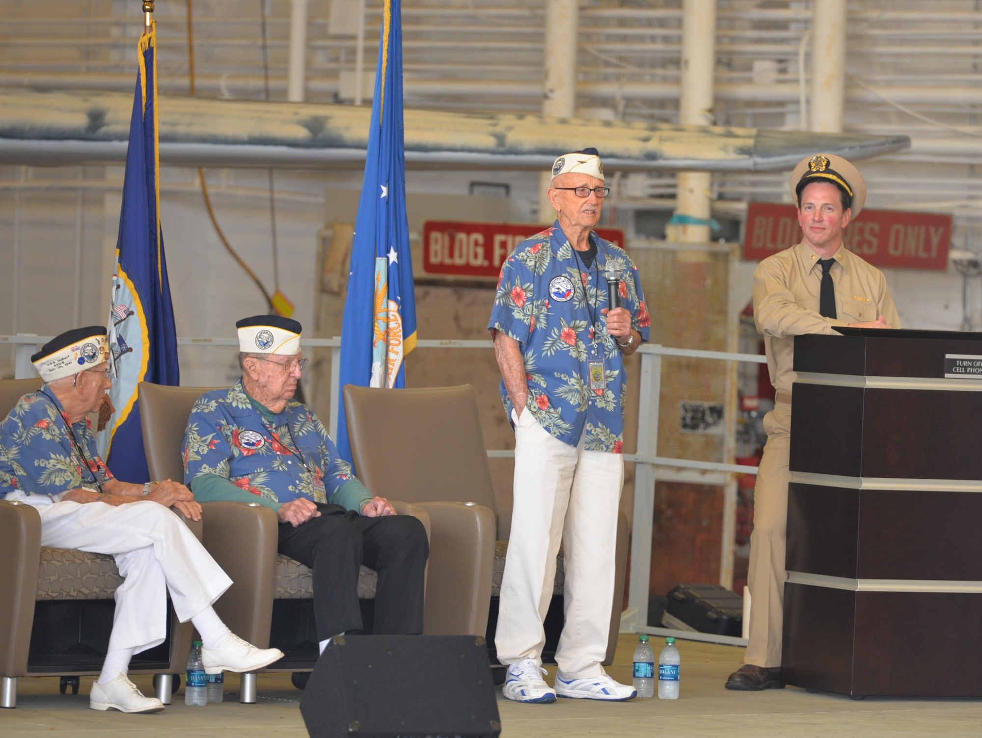 Navy veterans Jay Carraway and Frank Emond listen as fellow Pearl Harbor survivor Cass Phillips addresses more than 500 attendees of the Doolittle Raiders Association commemoration of the Doolittle Raid on Tokyo at Naval Air Station Pensacola, Fla., April 15, 2016. (U.S. Air Force photo by Randy Martin) 