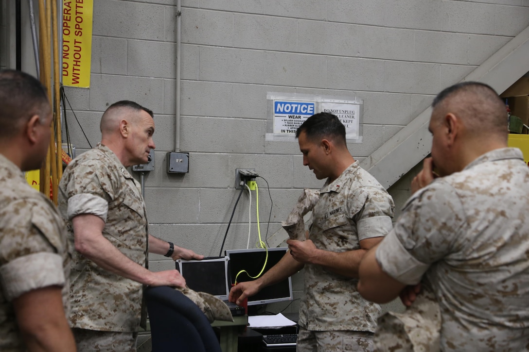 CWO3 Evanson discuss the employment and way ahead for the Electronic Maintenance Support System with MajGen. Coglianese