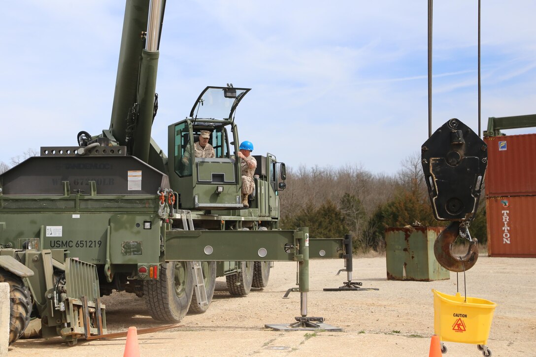 SSgt Staffne assist MajGen. Coglianese with the All Terrian Crane.