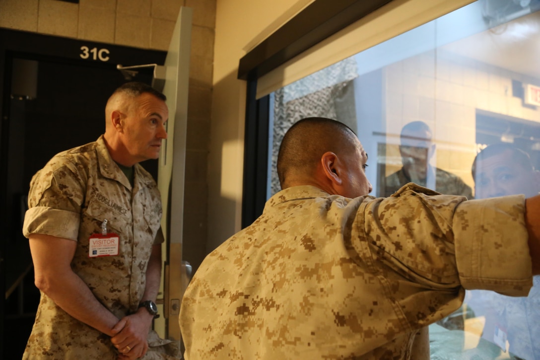MGySgt Torres gives MajGen. Coglianese a tour of the Chemical Defense Training Facility.