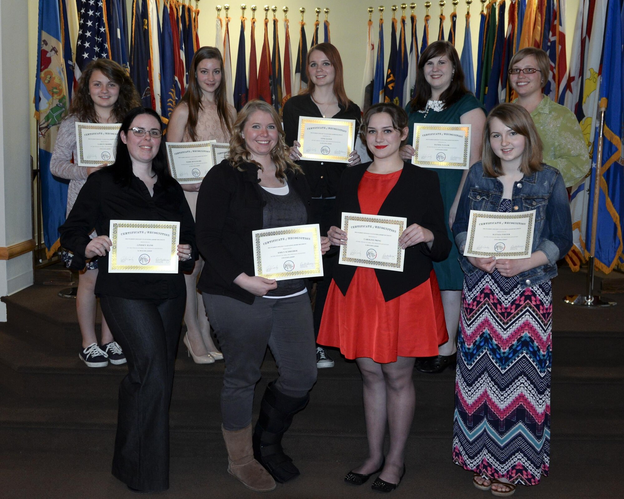 Spouses’ Club Annual Scholarship Award recipients pose with their certificates after the scholarship award ceremony April 19, 2016. Twelve winners were selected by the 2015-2016 scholarship judges. (U.S. Air Force photo by Airmen 1st Class Malcolm Mayfield)