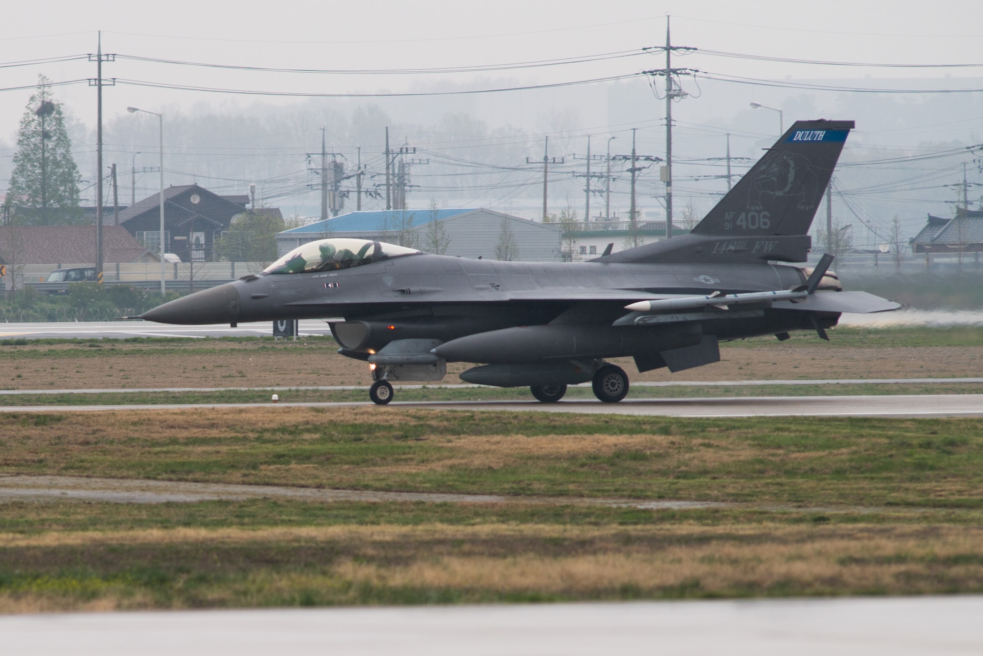 An F-16 Fighting Falcon from the 148th Fighter Wing taxis on the flightline after arriving to Osan Air Base, Republic of Korea, April 20, 2016. The 148th FW out of Duluth Air National Guard Base, Minnesota, deployed 12 F-16 aircraft to Osan as part of a theater security package to enhance regional security on the Korea Peninsula. The U.S. Air Force routinely deploys force packages of fighters throughout the Republic of Korea to demonstrate the U.S. commitment to stability on the Korea Peninsula. (U.S. Air Force photo by Senior Airman Dillian Bamman/Released)