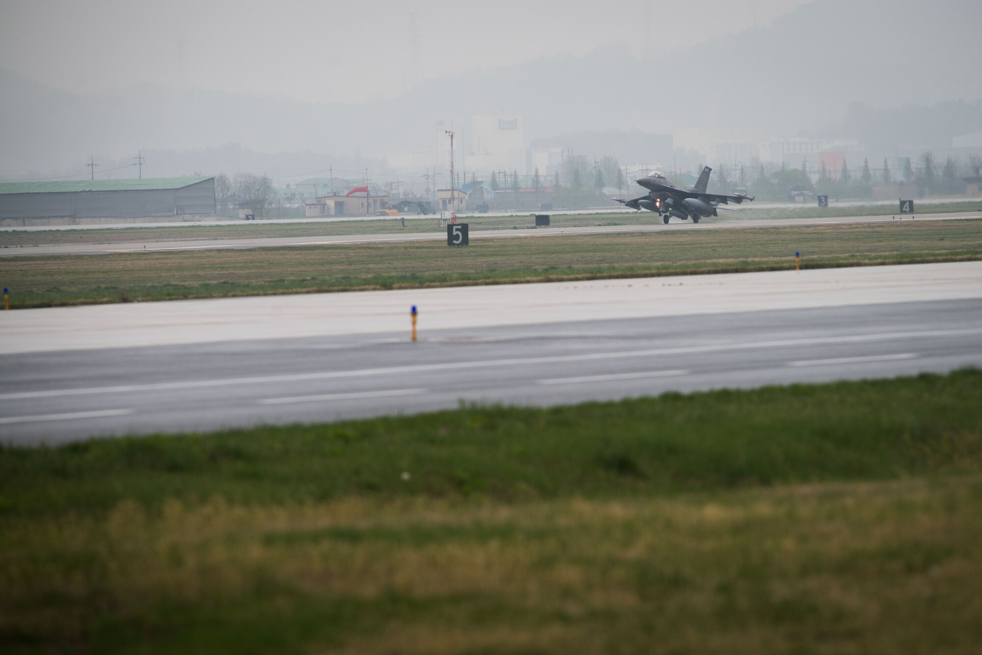 An F-16 Fighting Falcon from the 148th Fighter Wing taxis on the flightline after arriving to Osan Air Base, Republic of Korea, April 20, 2016. The 148th FW out of Duluth Air National Guard Base, Minnesota, deployed 12 F-16 aircraft to Osan as part of a theater security package to enhance regional security on the Korea Peninsula. The U.S. Air Force routinely deploys force packages of fighters throughout the Republic of Korea to demonstrate the U.S. commitment to stability on the Korea Peninsula. (U.S. Air Force photo by Senior Airman Dillian Bamman/Released)