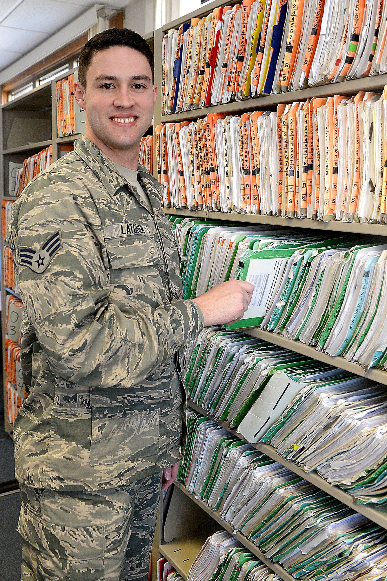 Senior Airman Jason Latchem, 375th Medical Operations Squadron health services manager, has recently been accepted to the Naval Officer Candidate School through a Navy transfer program. Latchem will go through a 12-week course in Newport, Rhode Island, which is essentially boot camp for naval officers. The program will focus on physical training, militarization, academics and the application of leadership. (U.S. Air Force photo by Senior Airman Megan Friedl)