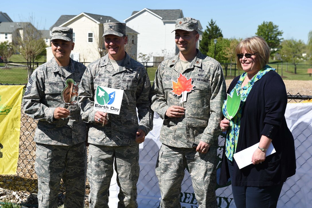 Team Andrews leadership poses for a picture after receiving the Tree City Award from the National Arbor Day Foundation at a tree planting ceremony in honor of Earth Day and Arbor Day at Joint Base Andrews, Md., April 20, 2016. JBA received its 16th award from the foundation and celebrated the 40th Anniversary of the Tree City Program. (U.S. Air Force photo by Senior Airman Joshua R. M. Dewberry/RELEASED)