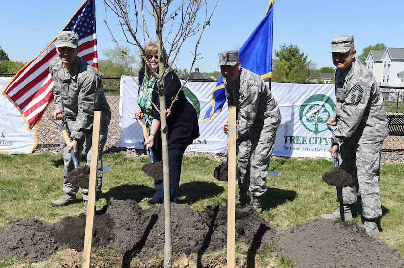 Team Andrews leadership poses for a picture before planting a red maple tree at a tree planting ceremony in honor of Earth Day and Arbor Day at Joint Base Andrews, Md., April 20, 2016. JBA received its 16th Tree City award from the National Arbor Day Foundation and celebrated the 40th Anniversary of the Tree City Program. (U.S. Air Force photo by Senior Airman Joshua R. M. Dewberry/RELEASED)