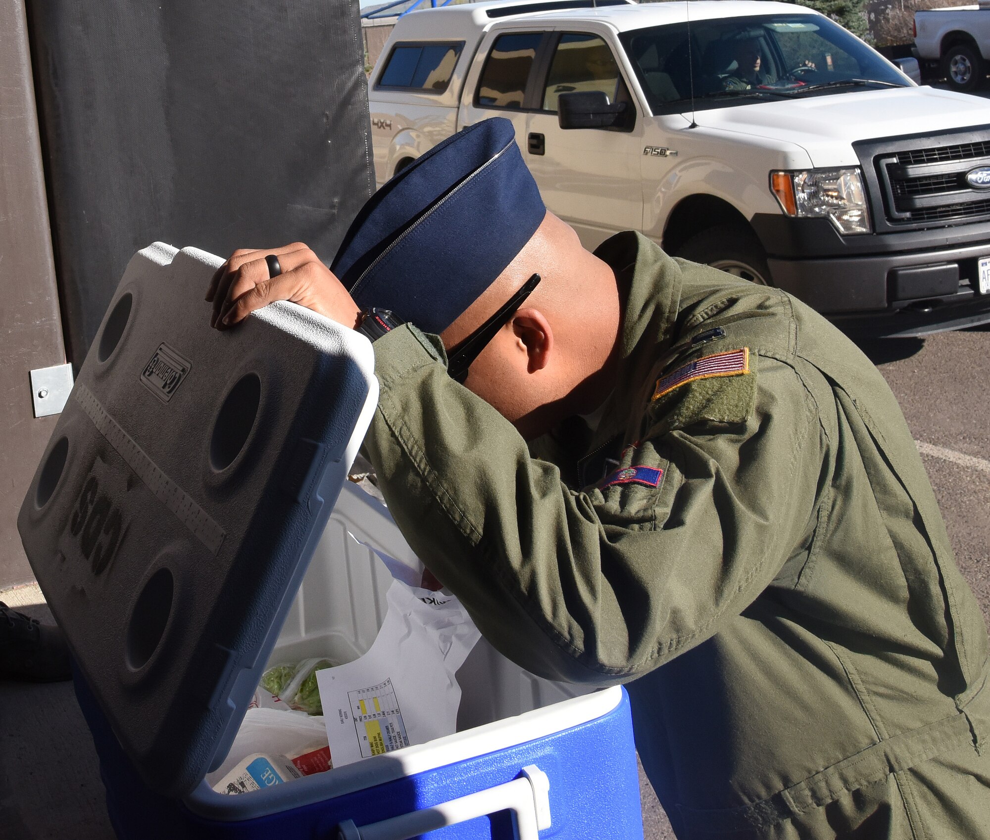 Capt. Troy Meno, 341st Operations Group operations officer, checks a cooler before taking it to a missile alert facility April 21, 2016, at Malmstrom Air Force Base, Mont. Orders are brought to the site in coolers by missile alert crews posting out to the missile field, and in the evening the returning crews bring back the coolers. (U.S. Air Force photo/Senior Airman Jaeda Tookes)