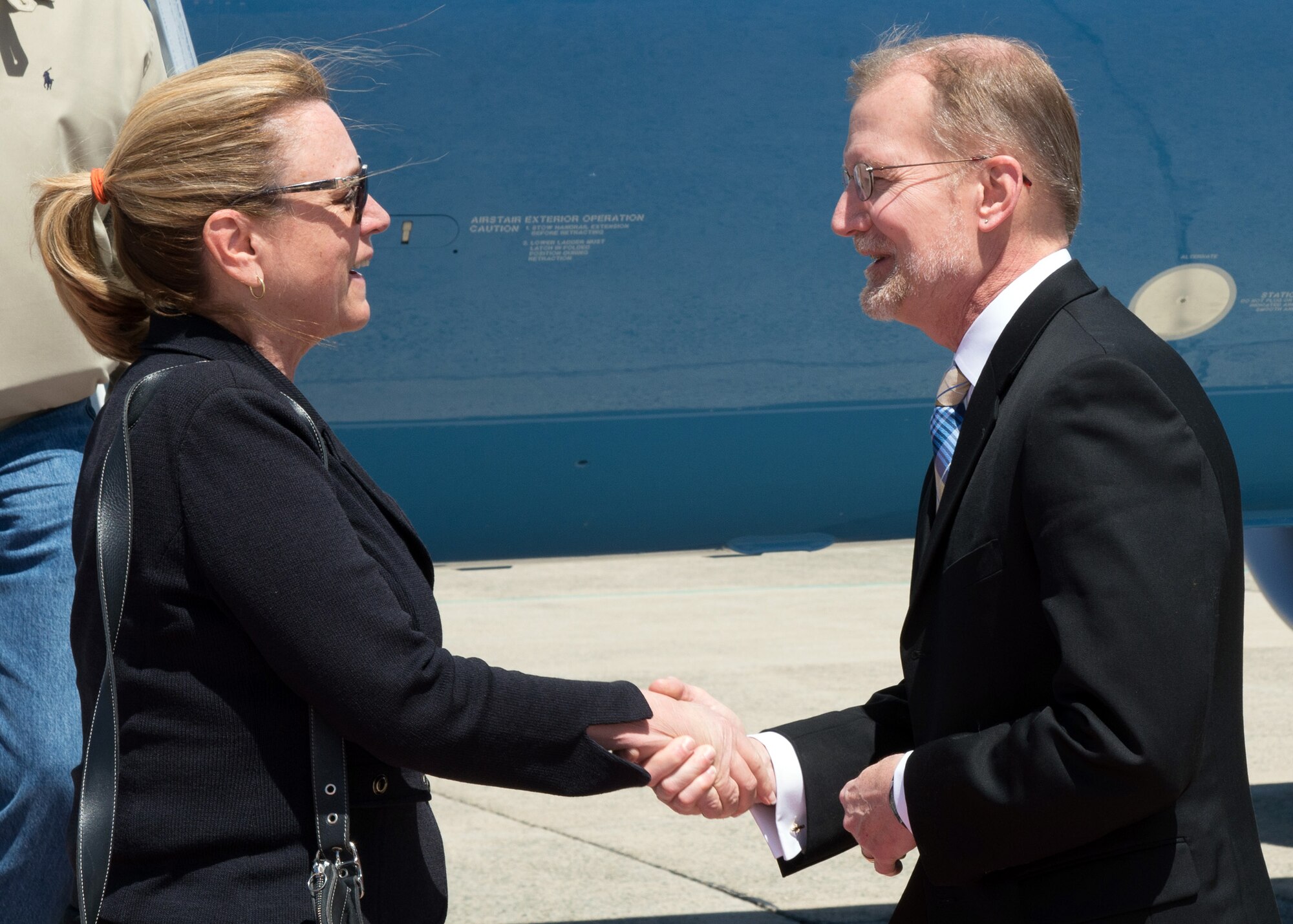 Secretary of the Air Force Deborah Lee James is welcomed to Hanscom Air Force Base, Mass., by Steve Wert, Battle Management program executive officer, on the base flightline April 21. James will be participating in an innovation forum in the area to educate non-traditional vendors about doing business with the Air Force. (U.S. Air Force photo by Mark Herlihy)