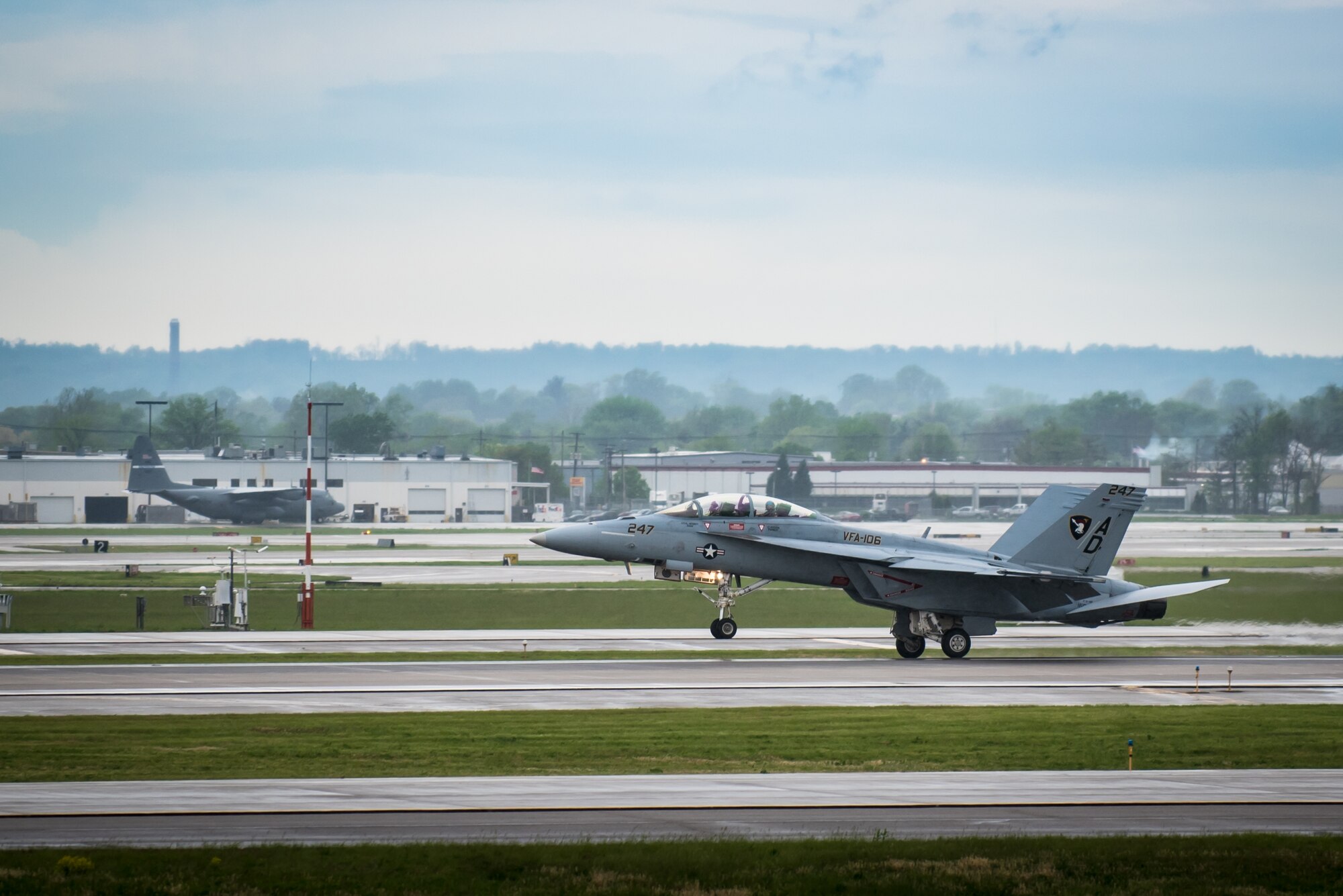 A U.S. Navy F/A-18 Hornet fighter jet arrives at the Kentucky Air National Guard Base in Louisville, Ky., April 21, 2016. The aircraft, assigned to Naval Air Station Oceana in Virginia Beach, Va., will be part of a two-ship aerobatic demonstration during the Thunder Over Louisville air show scheduled for April 23. The Kentucky Air National Guard is once again serving as the base of operations for all military aircraft performing in the show, providing logistical and maintenance support. (U.S. Air National Guard photo by Maj. Dale Greer)
