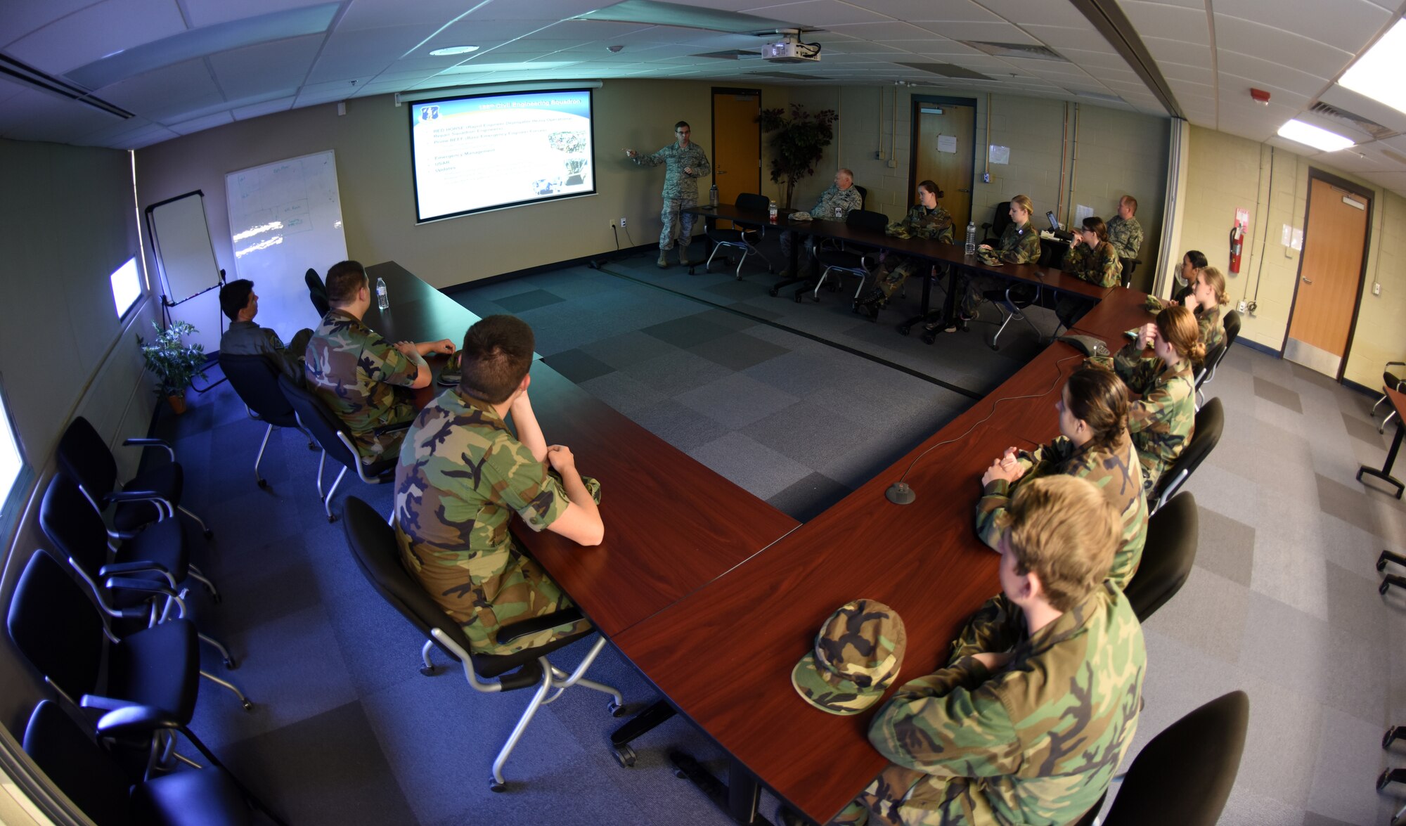 Members of the Greenwood High School Junior Reserve Officer Training Corps are shown the capabilities within the 188th Intelligence Support Squadron by Chief Master Sgt. Carl Schneider, 188th ISS superintendent, April 13, 2016, during their tour of Ebbing Air National Guard Base, Fort Smith, Ark. JROTC cadets viewed many of the career opportunities provided on base, including being a remotely piloted aircraft pilot, security forces member or working in intelligence. (U.S. Air National Guard photo by Senior Airman Cody Martin/Released)