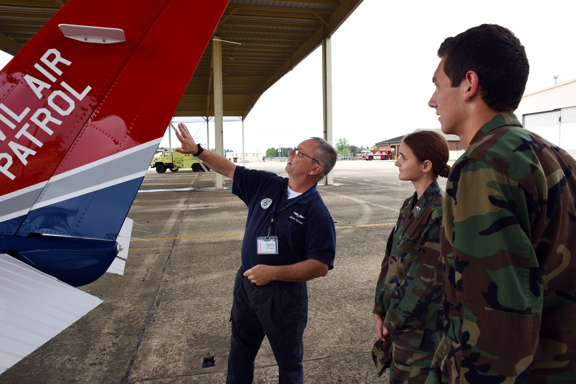 Members of the Greenwood High School Junior Reserve Officer Training Corps are provided information on the Cessna 182T prior to flight by Capt. Bradley Kidder, public affairs and director of operations with the 83rd Composite Squadron, United States Air Force Auxiliary Civil Air Patrol April 13, 2016, during their tour of Ebbing Air National Guard Base, Fort Smith, Ark. JROTC cadets viewed many of the career opportunities provided on base, including being a remotely piloted aircraft pilot, security forces member or working in intelligence. (U.S. Air National Guard photo by Senior Airman Cody Martin/Released)