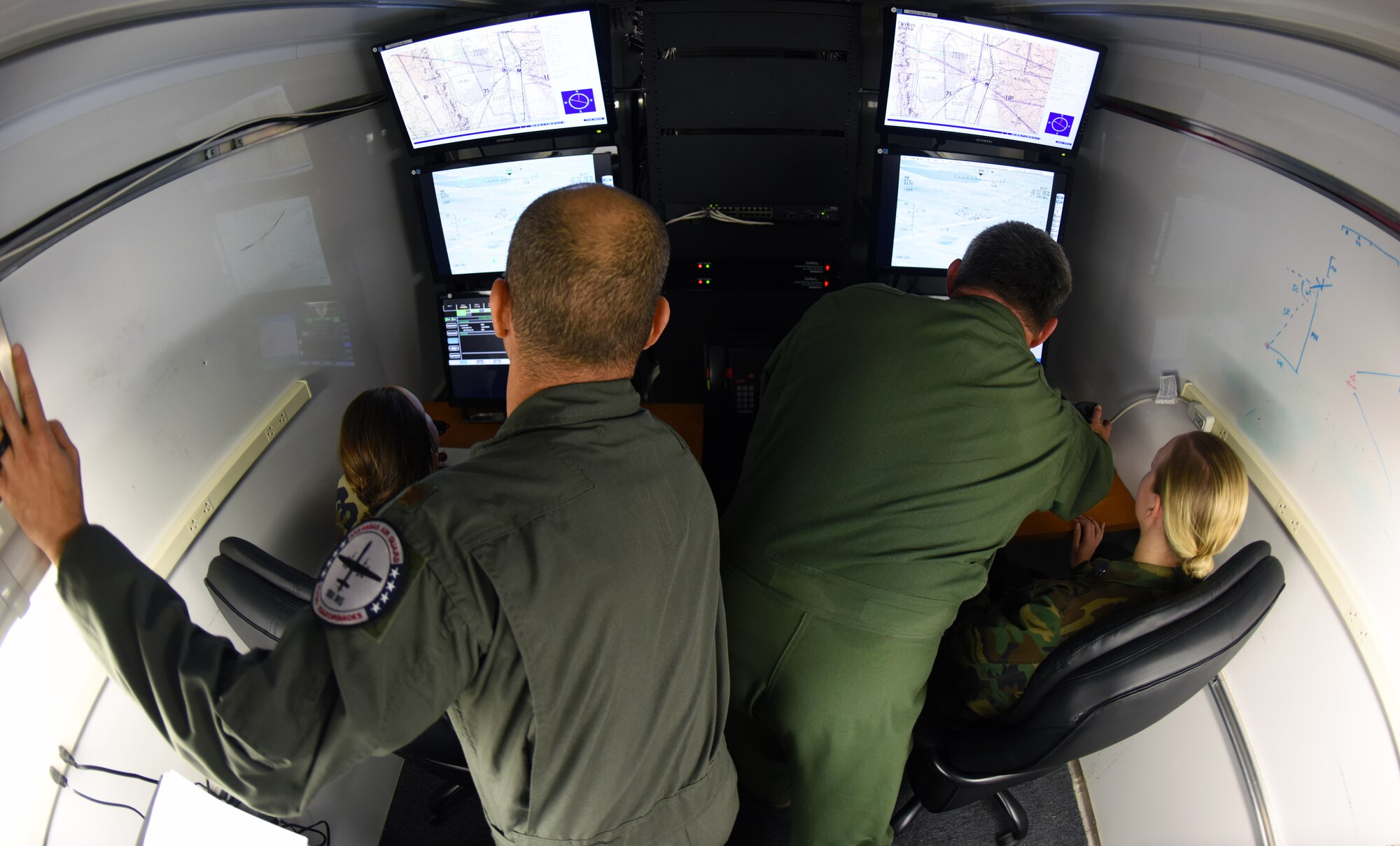 Members of the Greenwood High School Junior Reserve Officer Training Corps experience piloting a remotely piloted aircraft provide April 13, 2016, during their tour of Ebbing Air National Guard Base, Fort Smith, Ark. JROTC cadets viewed many of the career opportunities provided on base, including being a remotely piloted aircraft pilot, security forces member or working in intelligence. (U.S. Air National Guard photo by Senior Airman Cody Martin/Released)
