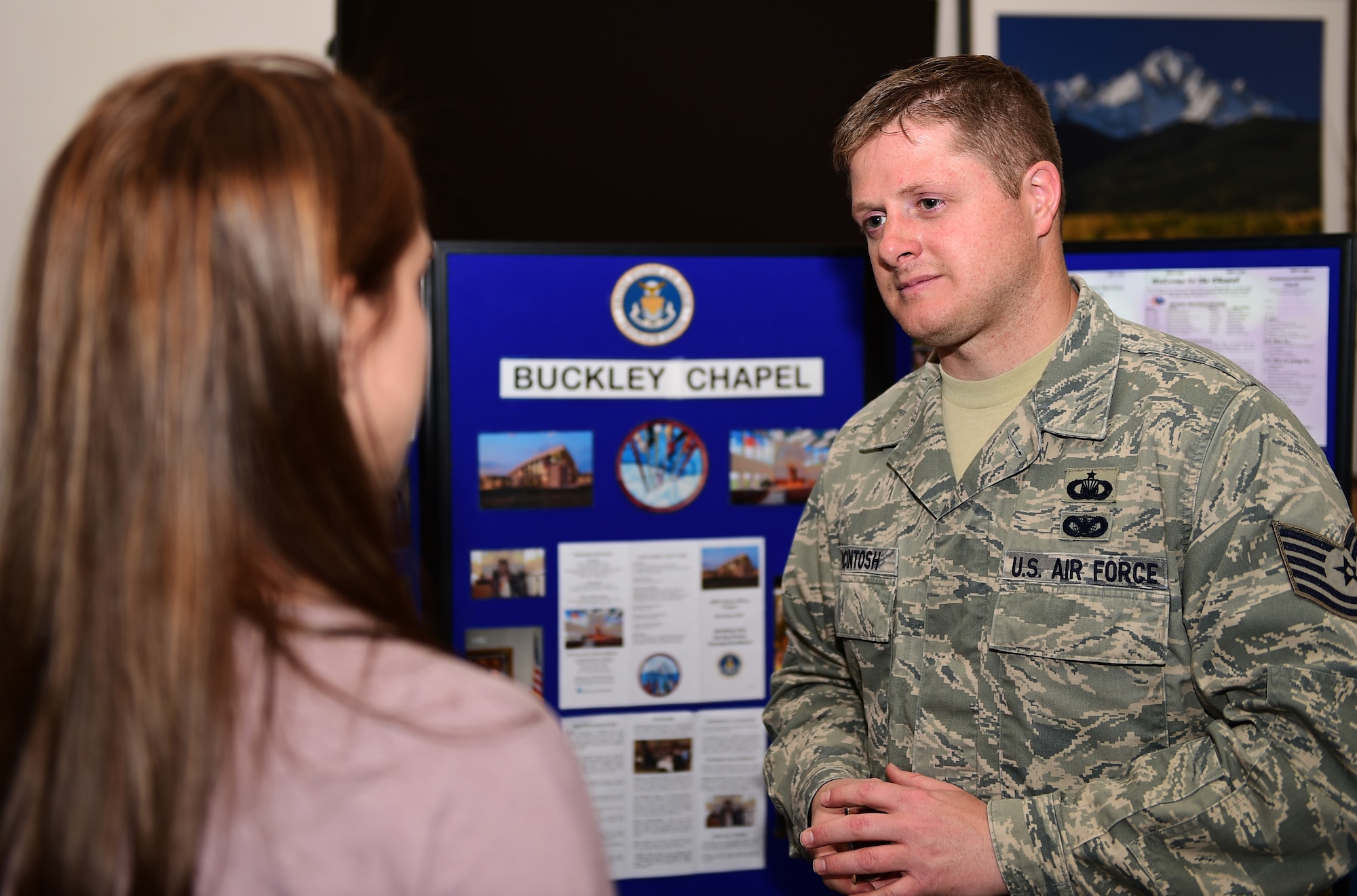 Tech. Sgt. John Paul McIntosh, 460th Space Wing NCO in charge of chapel operations, speaks about the chapel services during a Child Abuse Awareness Month information fair April 15, 2016, on Buckley Air Force Base, Colo. All families can benefit from strong support systems and resources in the face of these challenges, and as parents, friends, neighbors, and fellow human beings, keeping our kids safe is among the highest priorities. (U.S. Air Force photo by Senior Airman Racheal E. Watson/Released) 