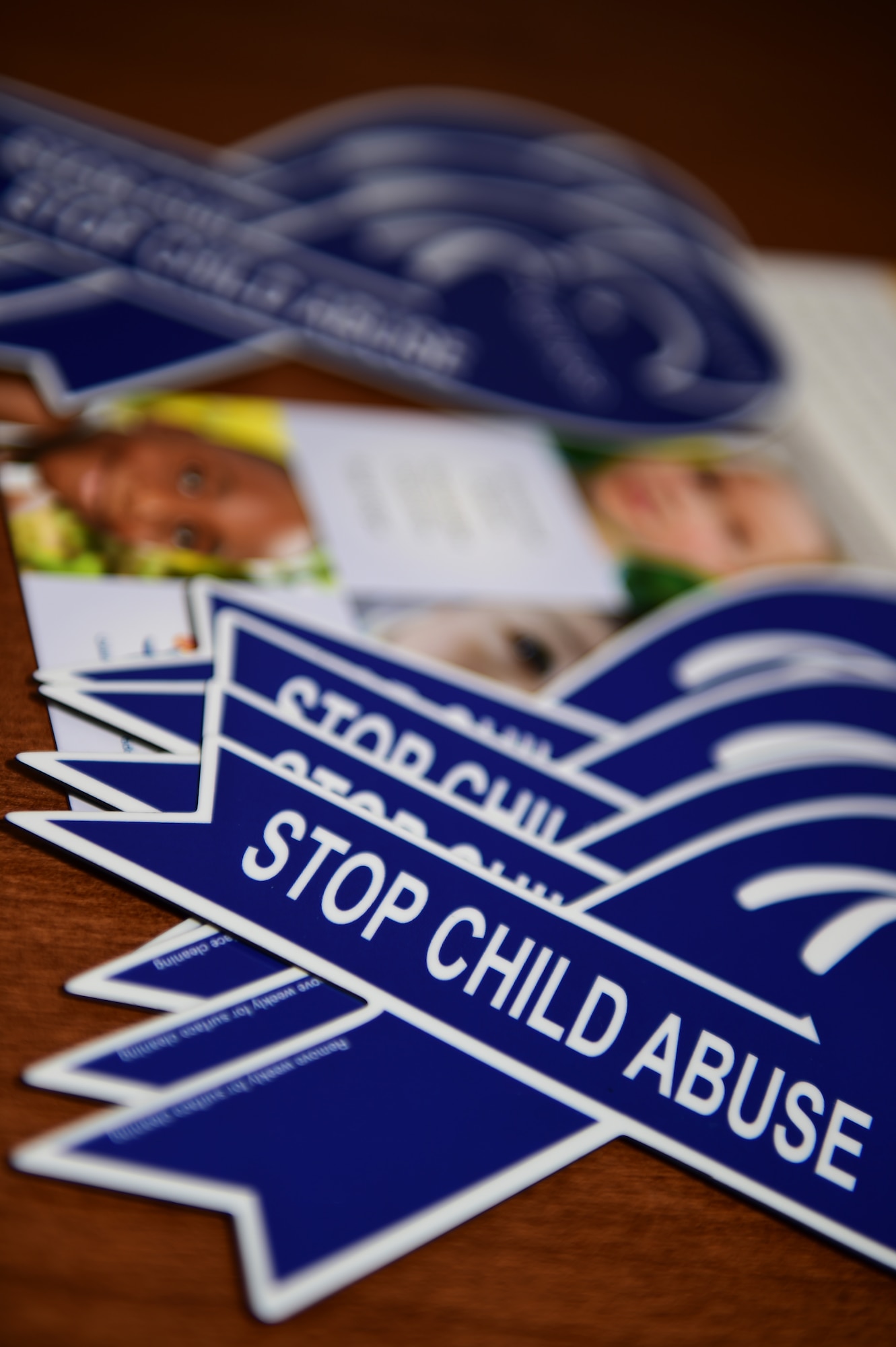 Child Abuse Awareness Month information lays on a table during an information fair April 15, 2016, on Buckley Air Force Base, Colo. During National Child Abuse Prevention Month, Buckley AFB members commit to giving every child a chance to succeed and to ensure that every child grows up in a safe, stable and nurturing environment that is free from abuse and neglect. (U.S. Air Force photo by Senior Airman Racheal E. Watson/Released) 