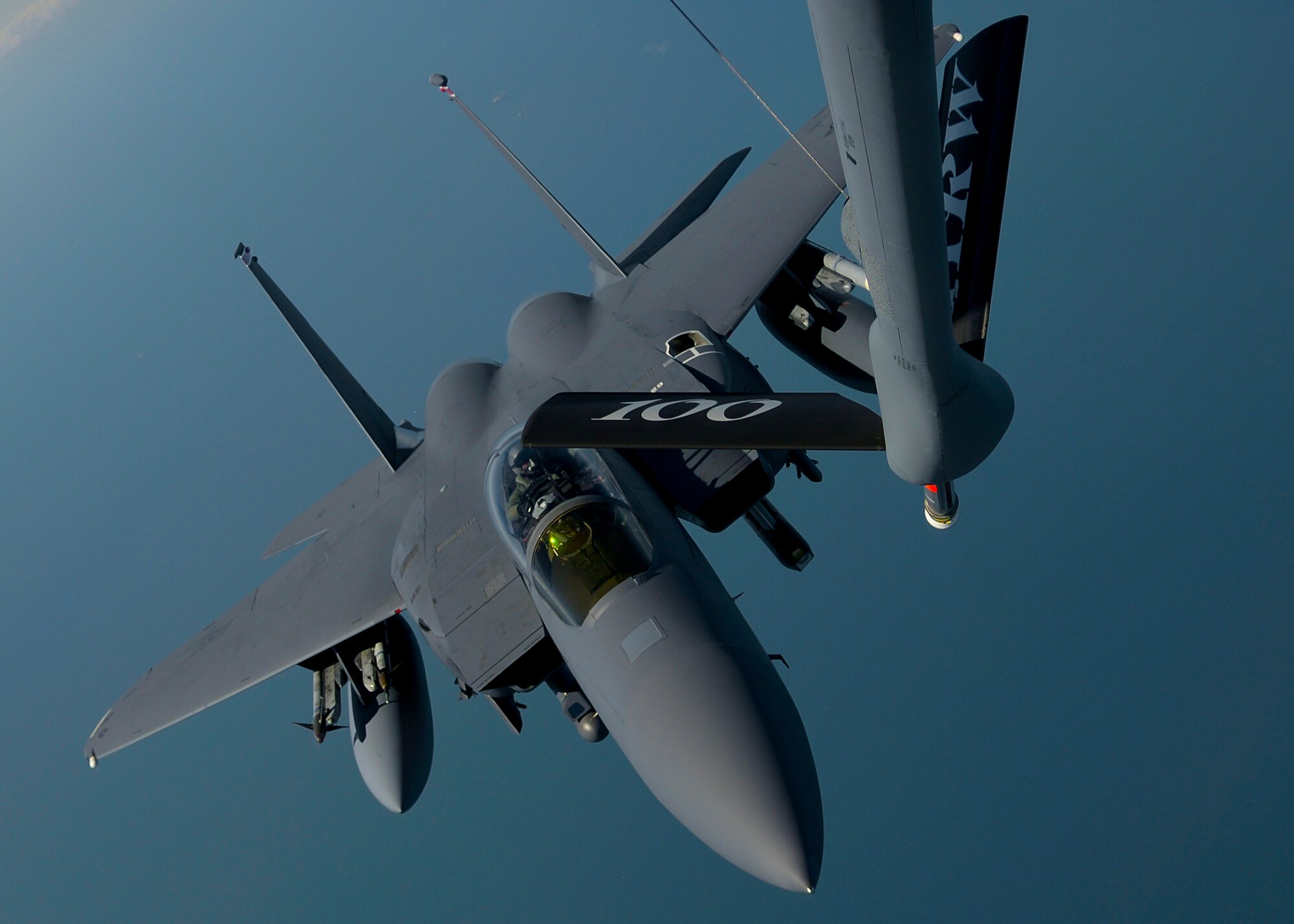 A U.S. Air Force 48th Fighter Wing F-15 Strike Eagle from RAF Lakenheath, England, approaches the boom of a 100th Air Refueling Wing KC-135 Stratotanker assigned to RAF Mildenhall, England April 19, 2016, over the Norfolk Sea. The 48th FW participated in air training drills alongside U.S.A.F. F-22s and other Europe-based aircraft in support of exercise Iron Hand. (U.S. Air Force photo by Senior Airman Victoria H. Taylor/Released)