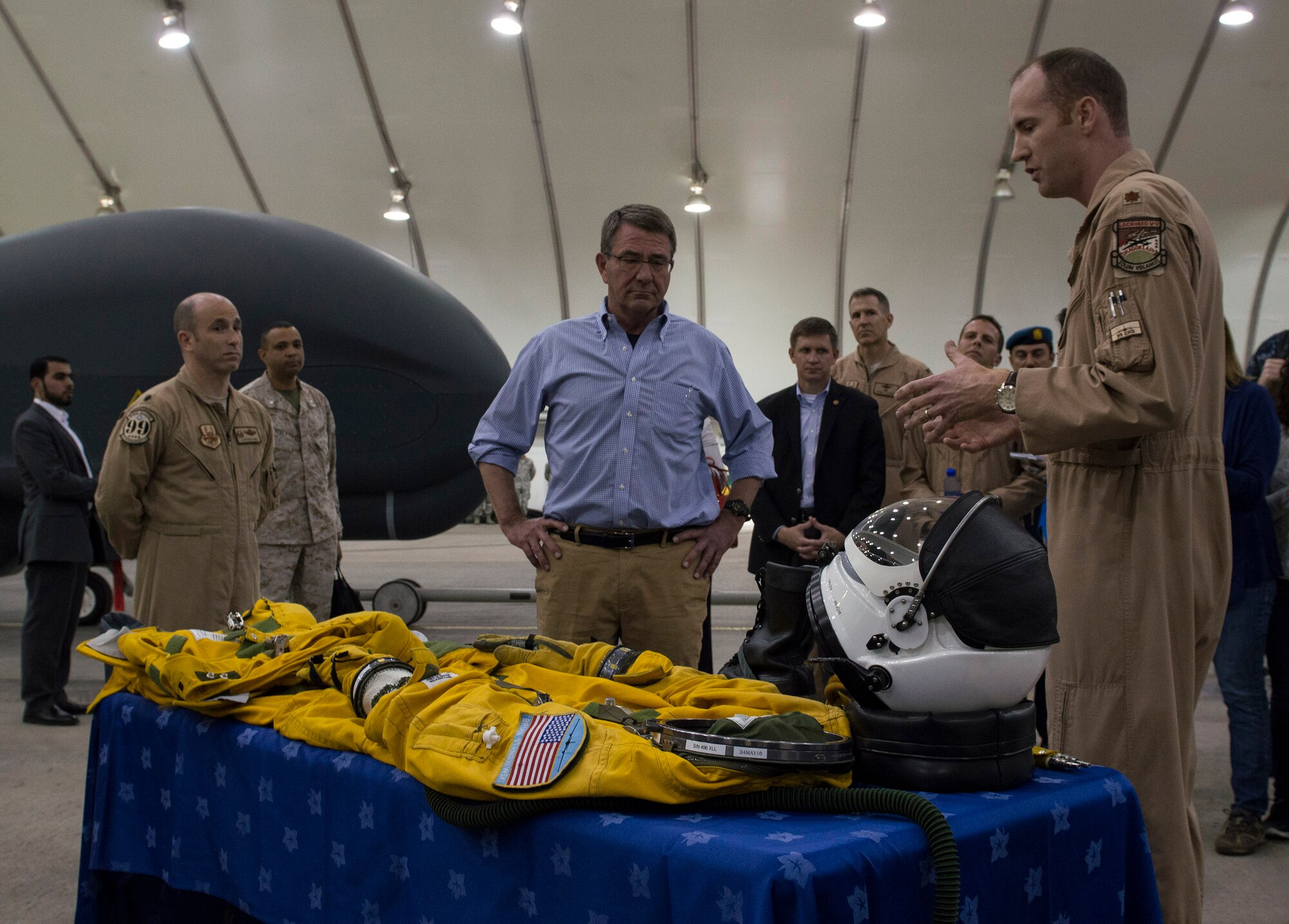 U.S. Secretary of Defense Ash Carter speaks with a U-2 Dragon Lady reconnaissance pilot at an undisclosed location in Southwest Asia, April 16, 2016. Secretary Carter spoke with service members there about the importance of their role in accelerating the lasting defeat of ISIL. (U.S. Air Force photo by Staff Sgt. Chad Warren)