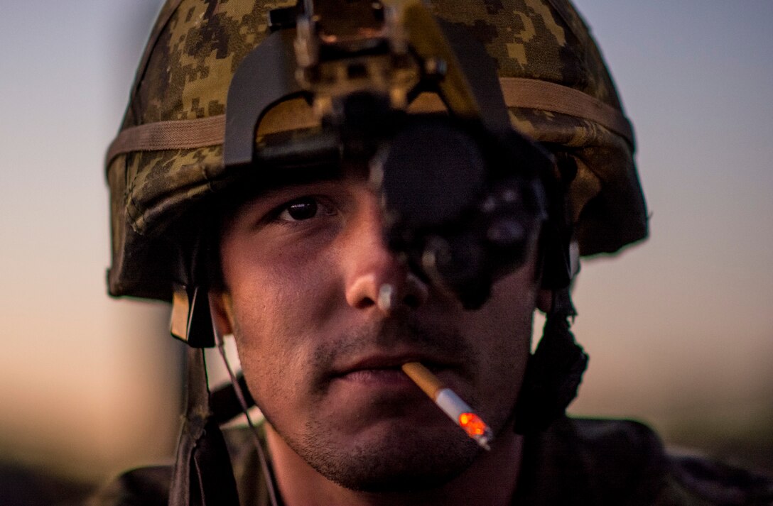 Portrait Personality: Army Pvt. Charles Lemieux poses for a photo while wearing his night optical device for a light machine gun night fire event during the 2015 Canadian armed forces small arms concentration at the Connaught Range in Ottawa, Canada, Sept. 14, 2015. The marksmanship competition brought in more than 250 total competitors from the British, Canadian and U.S. armed forces competing in more than 50 matches involving rifle, pistol and light machine gun events using various combat-like movements and scenarios. Lemieux is a Canadian Army Reserve soldier assigned to the 2nd Division. Army photo by Master Sgt. Michel A. Sauret