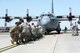 Members with the 374th Maintenance Squadron pull a C-130 Hercules at Yokota Air Base, Japan, April 15, 2016. The aircraft was pulled as part of the 374th Maintenance Group’s Maintenance Rodeo Competition, which pits squadrons against each other in various tasks to win points toward an award and bragging rights. (U.S. Air Force photo/Staff Sgt. Cody H. Ramirez)