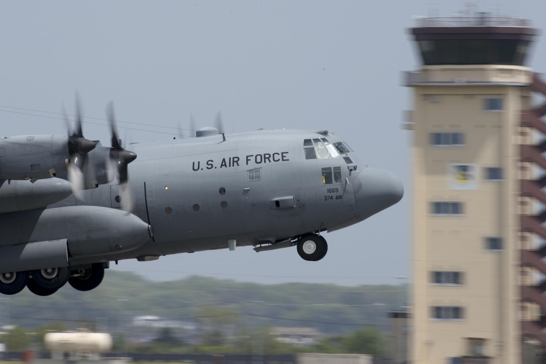 A C-130 Hercules takes off from Yokota Air Base, Japan, April 18, 2016. The 374th Airlift Wing sent two aircraft to support the Japanese government in their relief efforts for the series of earthquakes that recently took place in the Kyushu region. The aircraft transported heavy vehicles and personnel from Chitose Air Base, Hokkaido, to Kyushu. (U.S. Air Force photo/Yasuo Osakabe)