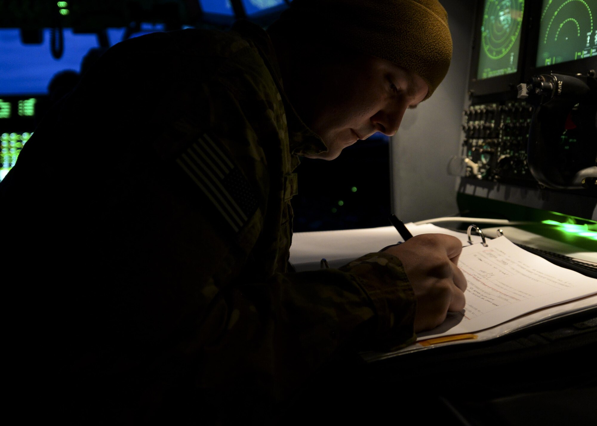 U.S. Air Force Senior Airman David Busch, 352nd Special Operations Air Maintenance Squadron MC-130J Commando II crew chief, performs maintenance checks during a pre-flight April 16, 2016, at Stuttgart Air Base, Germany. The preparations were made in order to conduct an airdrop mission with a U.S. Navy Maritime Craft Aerial Delivery System. (U.S. Air Force photo by Senior Airman Victoria H. Taylor/Released)