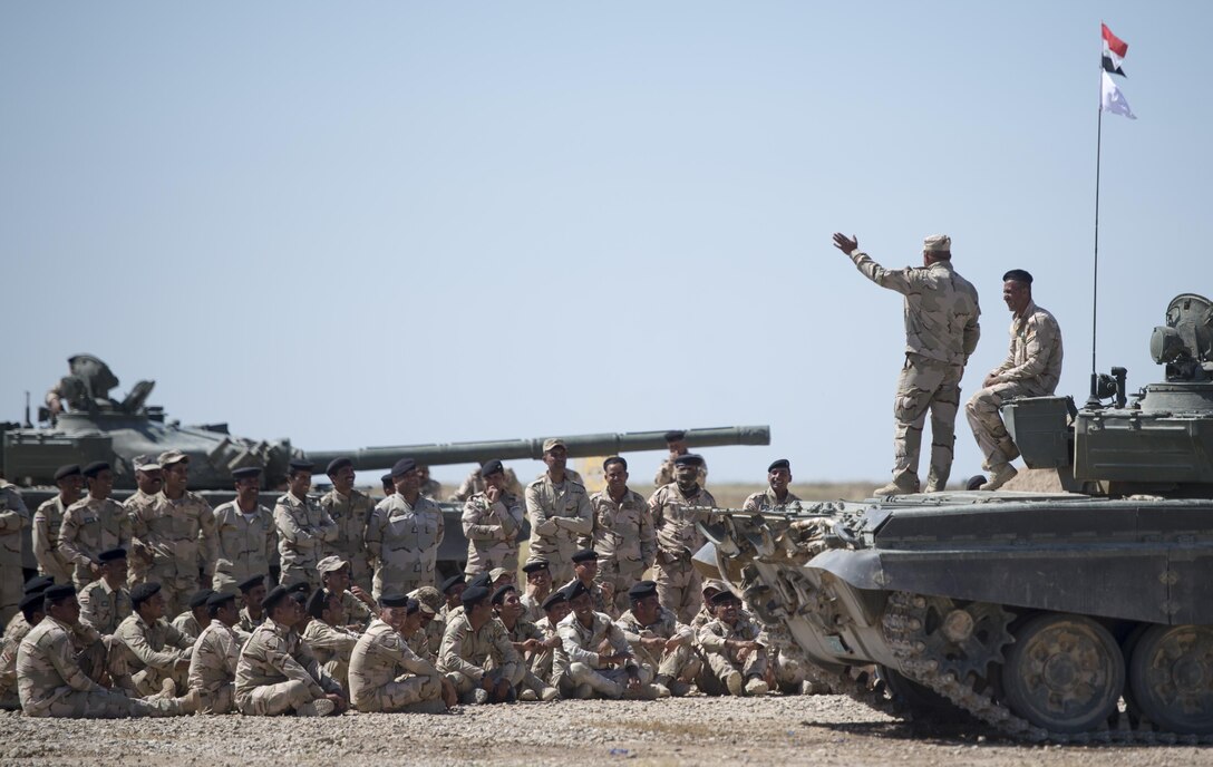 An Iraqi commander addresses his troops at Besmaya Range Complex, Iraq, April  21, 2016.  DoD photo by Navy Petty Officer 2nd Class Dominique A. Pineiro