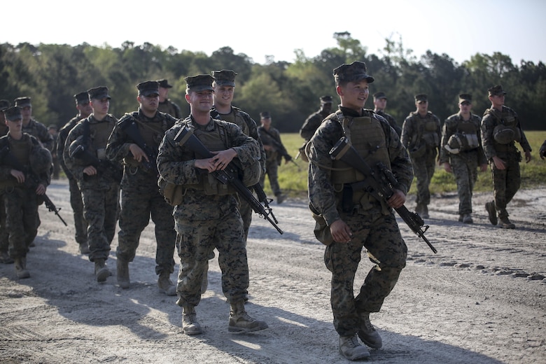 Marines with 2nd Combat Engineer Battalion conduct a hike to their new command post at Camp Lejeune, N.C., April 21, 2016. The hike, led by Maj. Gen. Brian Beaudreault, commanding general 2nd Marine Division; Lt. Col. Gary A. McCullar, the commanding officer of 2nd CEB; and Sgt. Maj. Demetrius L. Hadley, the sergeant major of 2nd CEB, covered 12 miles. (U.S. Marine Corps photo by Cpl. Paul S. Martinez/Released)