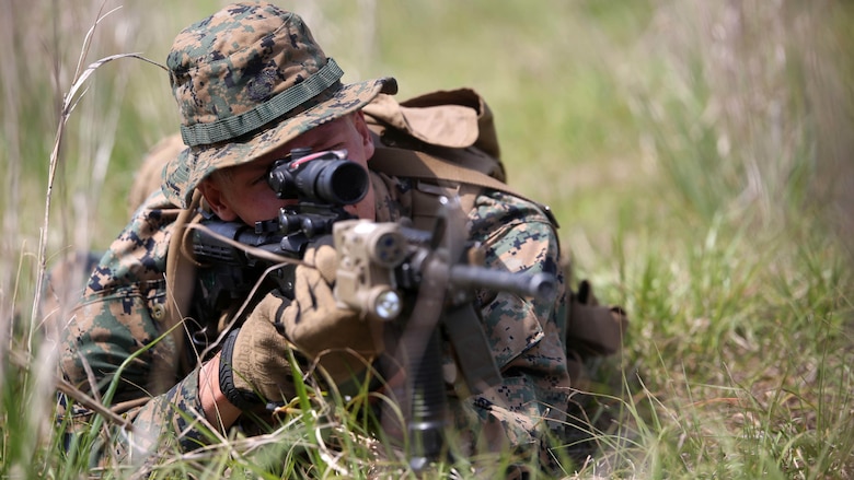 Pfc. Nicholas Frantz, a grenadier with 3rd Battalion, 2nd Marine Regiment, suppresses the enemy during a training exercise at Marine Corps Base Camp Lejeune, N.C., April 20, 2016. The unit practiced buddy rushing and squad tactics to maintain readiness and prepare for future deployments. 