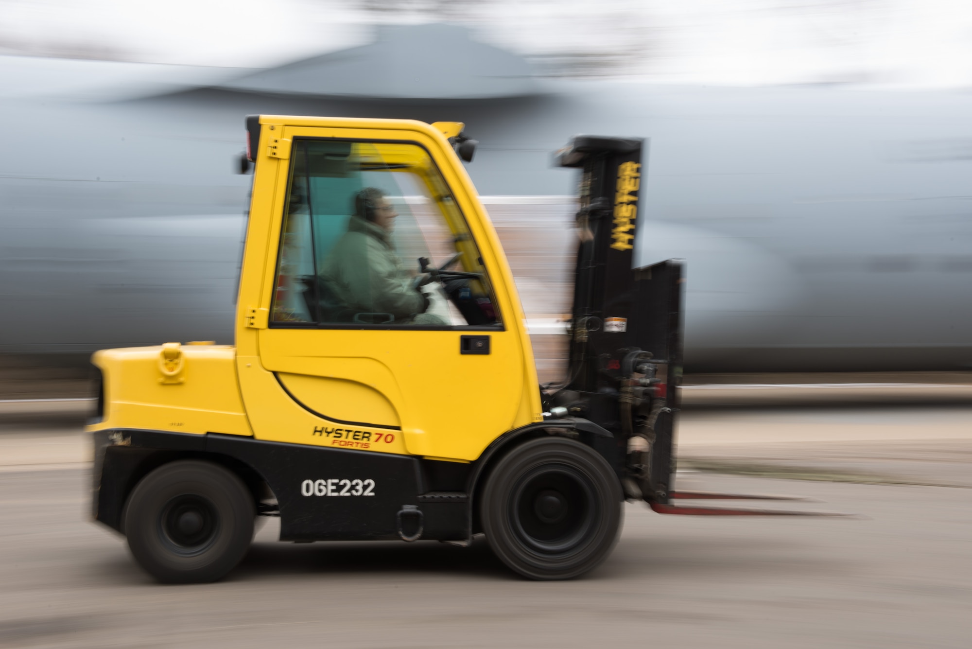 Tech Sgt. Darren Mora drives a 3k forklift at the 27th Aerial Port Squadron in support of the humanitarian mission to Afghanistan on March 5. (U.S. Air Force Photo by Staff Sgt. Trevor Saylor)