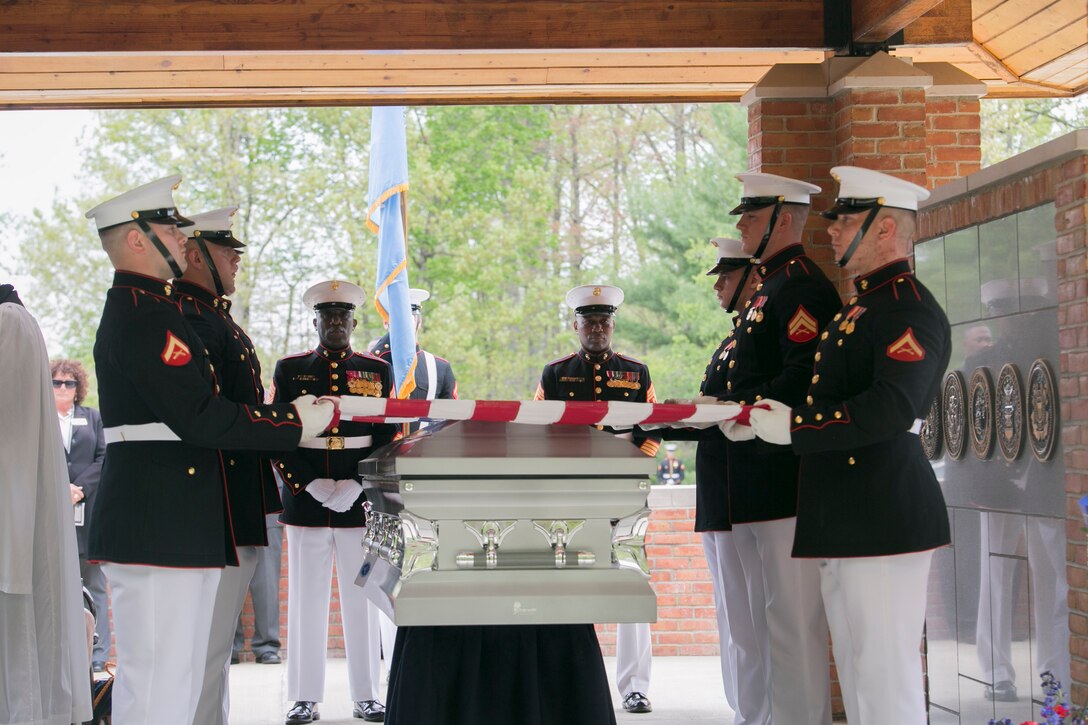 Body Bearers from Marine Barracks Washington, D.C. fold a flag during a funeral for Medal of Honor Recipient, Pfc. Hector A. Cafferata Jr., (USMCR) at Quantico National Cemetery, Va. April 22, 2016. According to Cafferata’s Medal of Honor award citation, on Nov. 28, 1950 while serving as a rifleman with Fox Company, 2nd Battalion, 7th Marines, 1st Marine Division, during the Chosin Reservoir Campaign, Cafferata’s fortitude, great personal valor, and dauntless perseverance in the face of almost certain death, saved the lives of several of his fellow Marines and contributed essentially to the success achieved by his company in maintaining its defensive position against tremendous odds. Cafferata passed away, April 12, 2016 at the age of 86. (Official Marine Corps photo by Cpl. Chi Nguyen/Released)