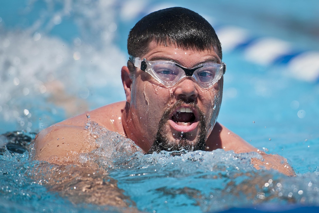 Courtney Hinson, a Warrior Games athlete, swims laps during an afternoon training session as part of an adaptive sports camp at Eglin Air Force Base, Fla., April 4, 2016. The base hosted a weeklong Warrior Games training camp before the yearly competition in June. Air Force photo by Samuel King Jr.