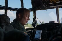 Lt. Col. Joe Hollman speaks with the flight crew prior to takeoff at Aviano AB, Italy, in support of Exercise Saber Junction April 12. (U.S. Air Force Photo by Staff Sgt. Trevor Saylor)