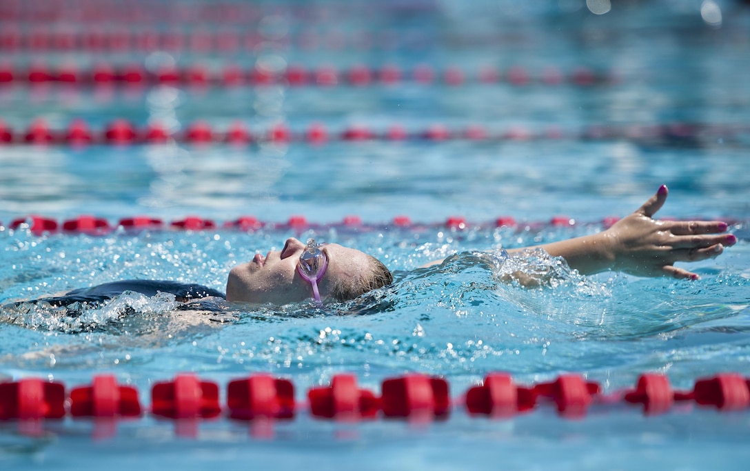 Heather Carter, a Warrior Games athlete, practices her backstroke during a morning swim session as part of an adaptive sports camp at Eglin Air Force Base, Fla., April 5, 2016. Air Force photo by Samuel King Jr.