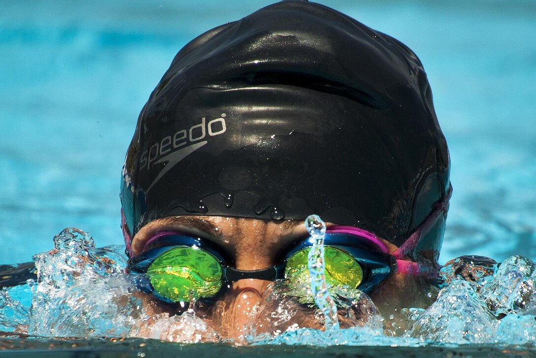 Tonya Perez, a Warrior Games athlete, lifts her head out of the water during an afternoon swim session at the Air Force team’s training camp at Eglin Air Force Base, Fla., April 7, 2016. Air Force photo by Samuel King Jr.