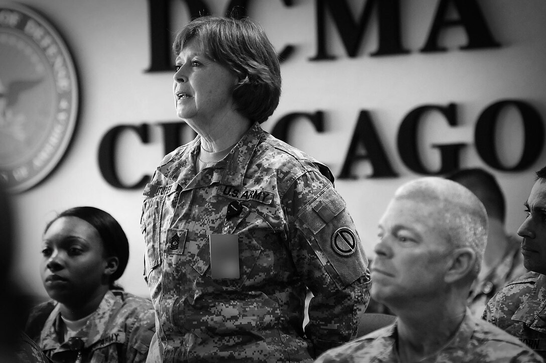 Master Sgt. Melody Tuper, Command Group, asks a question during the 85th Support Command's counseling brief. The command held the class to assist in eliminating the illusion that a counseling is only for corrective behavior, and that they should also be used in a positive nature. Since the new evaluation form release this past January, the unit has continually trained current and future raters to ensure the smoothest transition using the forms.
(Photo by Spc. David Lietz)