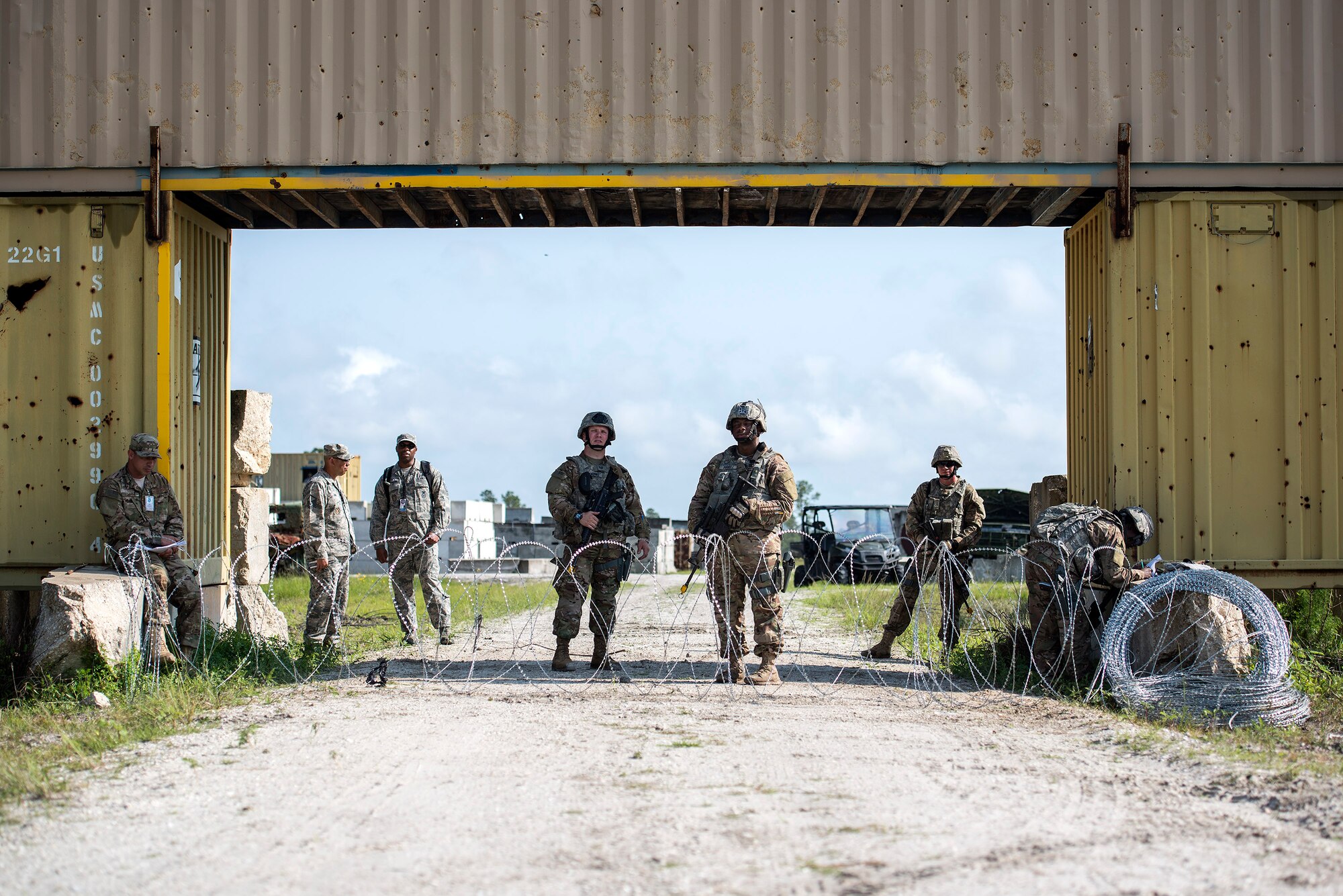 Airmen set up an entry control point during Spartan Warrior week April 14, 2016, Avon Park Air Force Range, Fla. Participants were graded on their ability to set-up and defend an entry control point. (U.S. Air Force photo by Airman 1st Class Janiqua P. Robinson/Released)