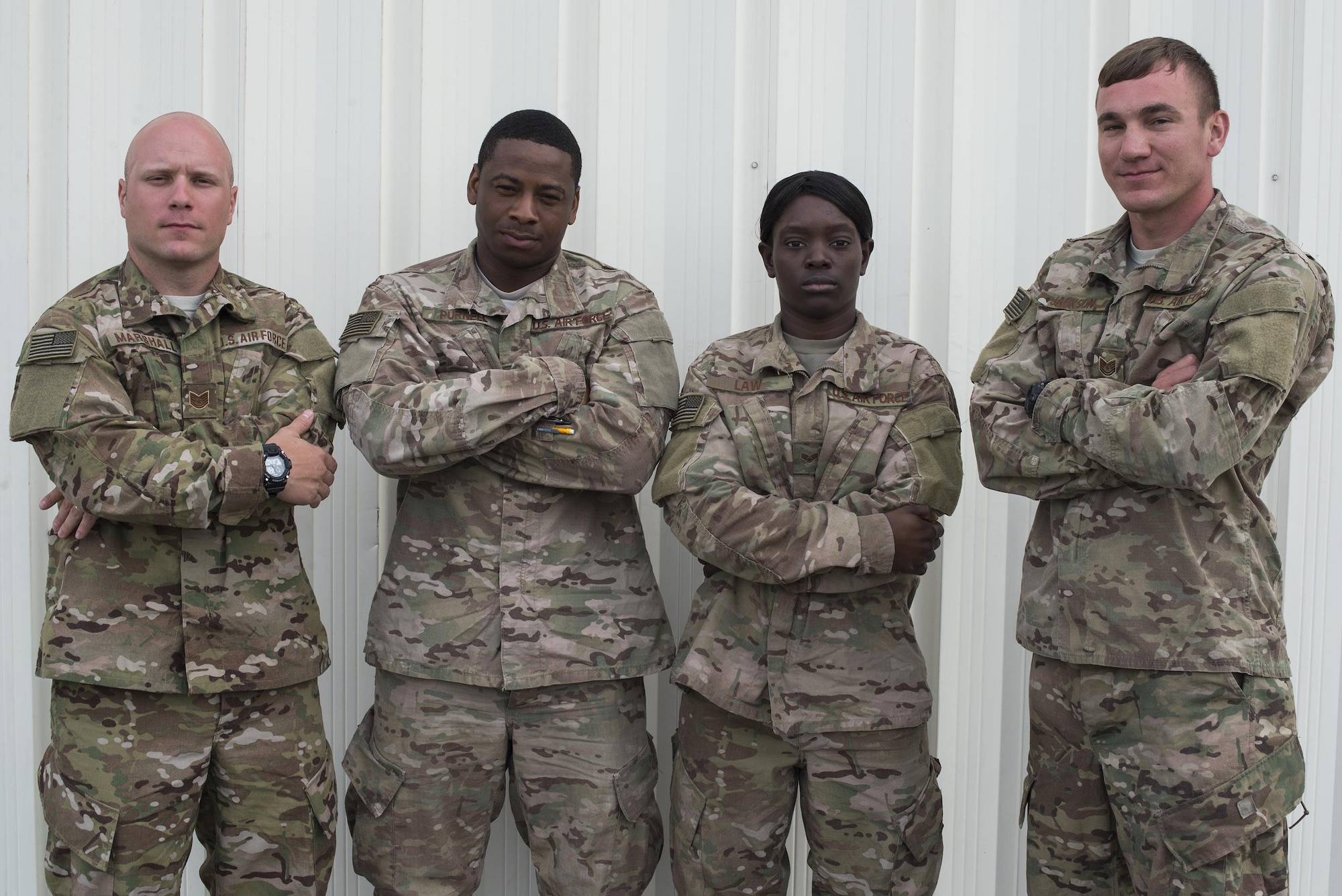 U.S. Air Force Airmen from the 823d Base Defense Squadron pose for a photo, April 15, 2016, at Avon Park Air Force Range, Fla. Spartan Warrior week allowed Airmen assigned to various squadrons across the U.S. to split into teams of four and compete in generalized and career based challenges. (U.S. Air Force photo by Airman 1st Class Janiqua P. Robinson/Released)
