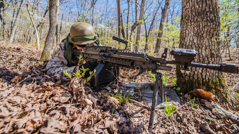 A student at the Marine Military Police Basic Course provides security during a field exercise at Fort Leonard Wood, Missouri, April 14, 2016. The exercise evaluates the skills of students in an expeditionary environment.