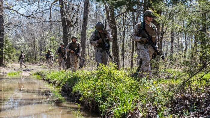 Students at the Marine Military Police Basic Course and the new Marine Military Police Officer Basic Course patrol during a field exercise at Fort Leonard Wood, Missouri, April 14, 2016. The exercise tests the Marines readiness for tasks they may be required to do in the fleet. 