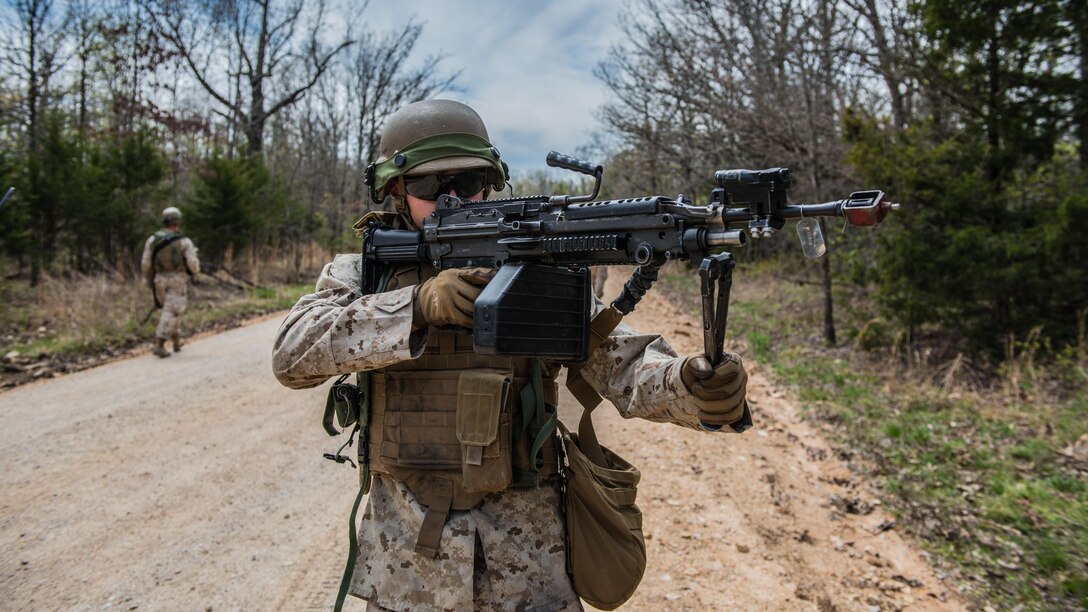 A student at the Marine Military Police Basic Course provides security while on patrol during a field exercise at Fort Leonard Wood, Missouri, April 14, 2016. Marines in this course learn how to properly provide security when on mounted and foot patrols. 